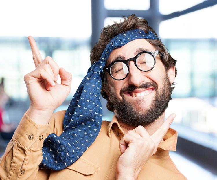 man with tie on head